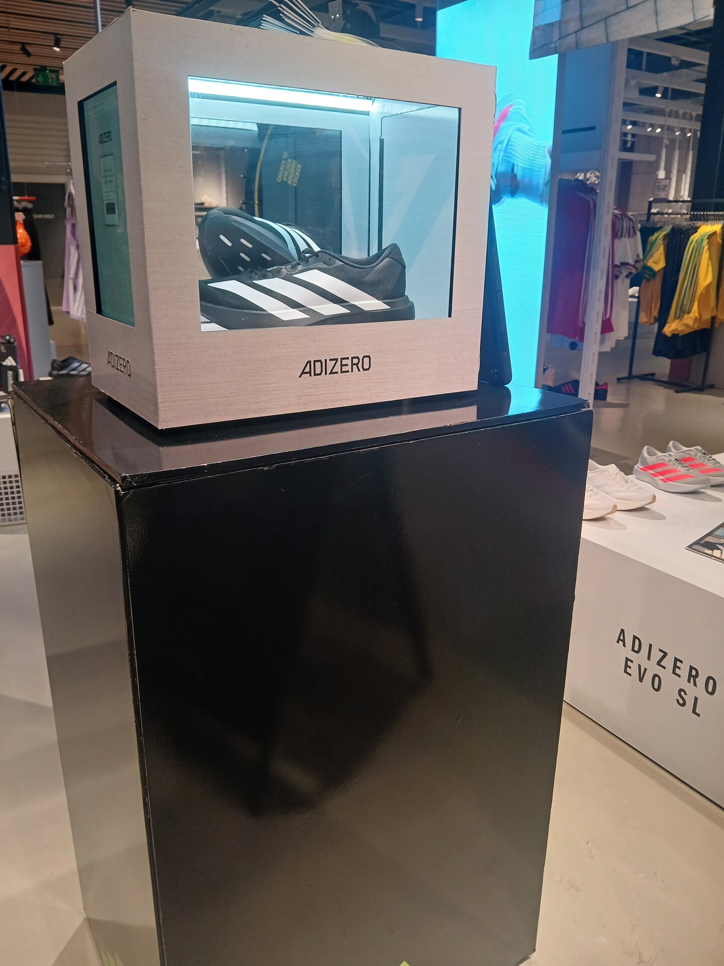 Adidas Adizero EVO SL interactive shoe-box display in store