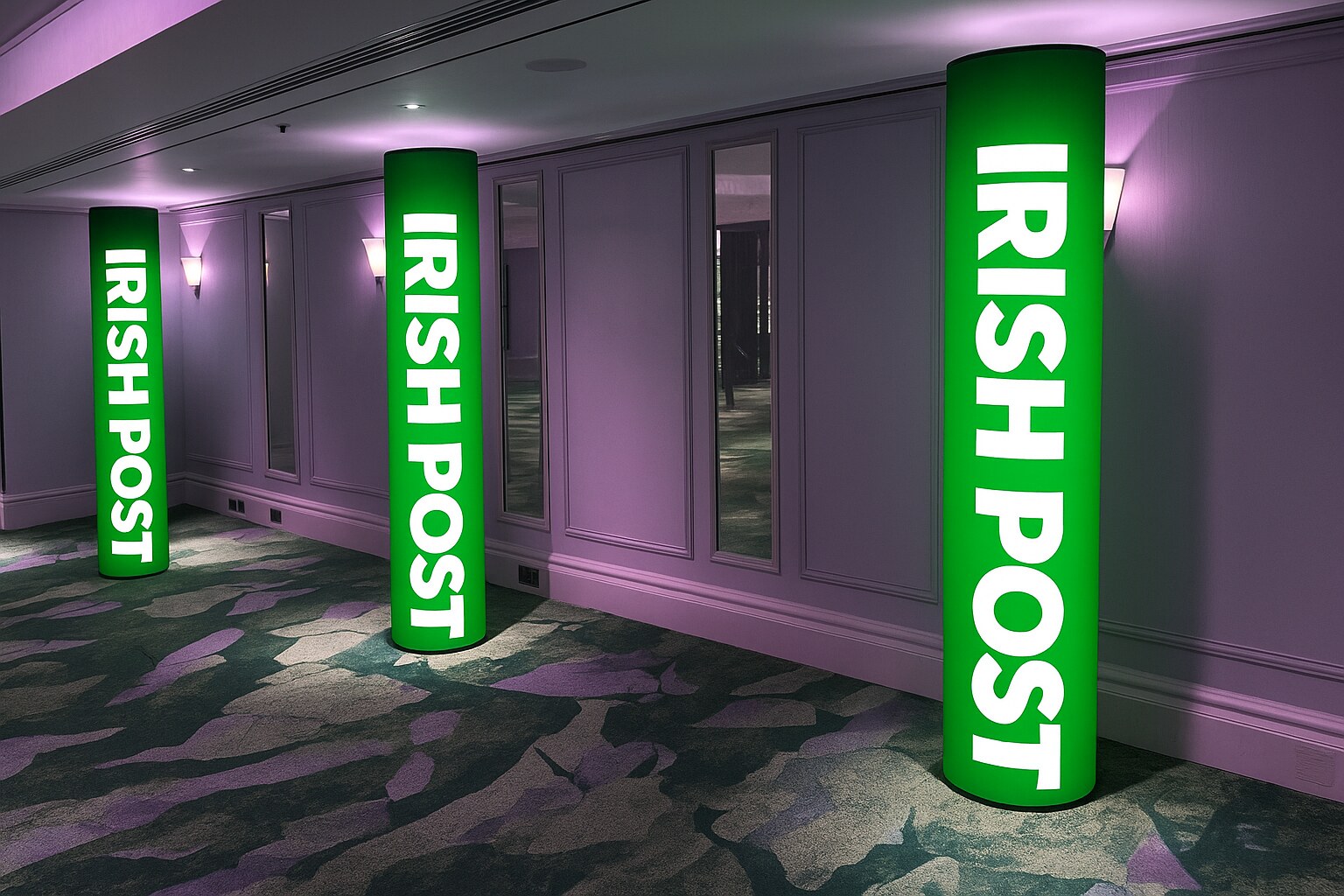 Green illuminated Irish Post Awards branded entrance pillars
